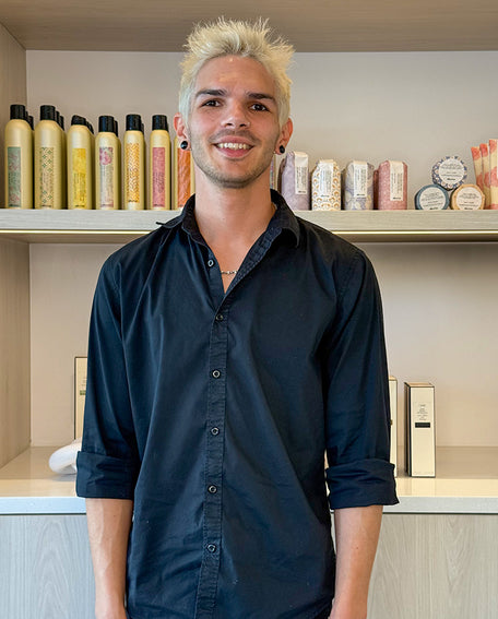 Portrait of Chris, salon assistant and apprentice at LAHH Salon in Miami