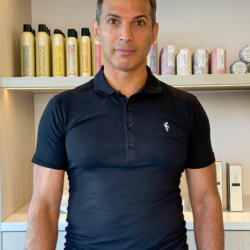 Portrait of Guy, master stylist at LAHH Salon in Miami