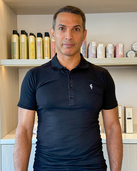 Portrait of Guy, master stylist at LAHH Salon in Miami