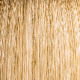 Rooted blonde hair extension with warm vanilla tones, dimensional and natural-looking.