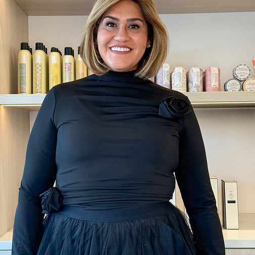 Portrait of Priscilla, stylist and colorist at LAHH Salon in Miami